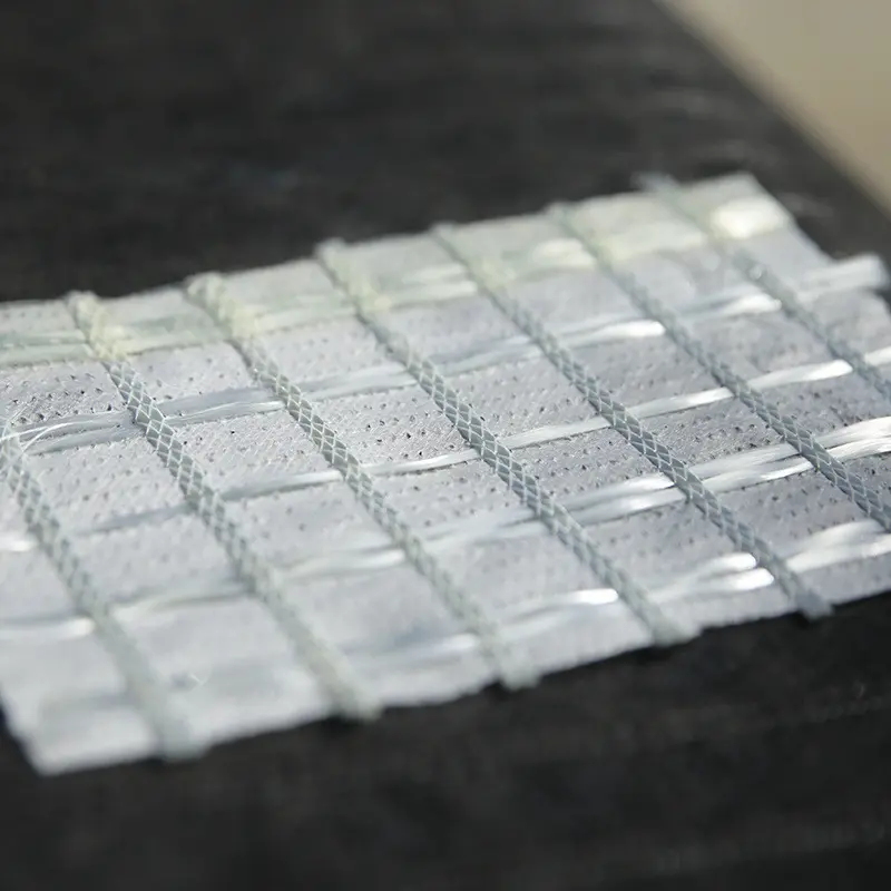 Warp knitted composite geotextiles prevent pavement cracks (2)