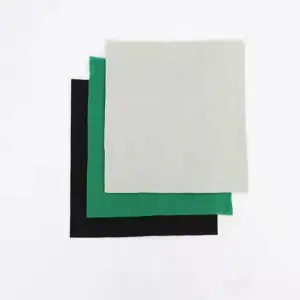 Reinforced high strength spun polyester filament woven geotextile