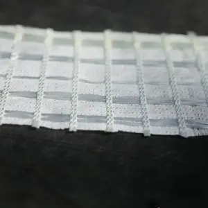 Warp knitted composite geotextiles prevent pavement cracks